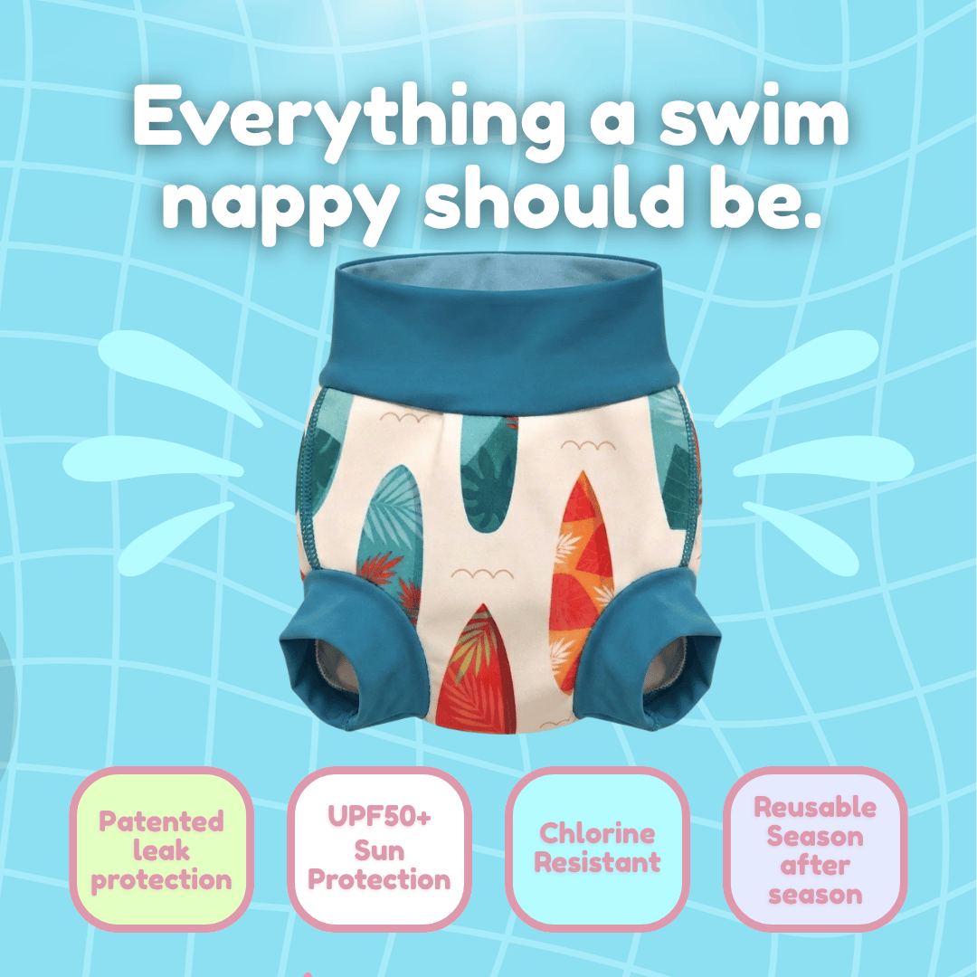 A reusable swim nappy with a tropical palm leaf and surfboard print, shown against a light blue water-themed background with promotional text and feature badges.